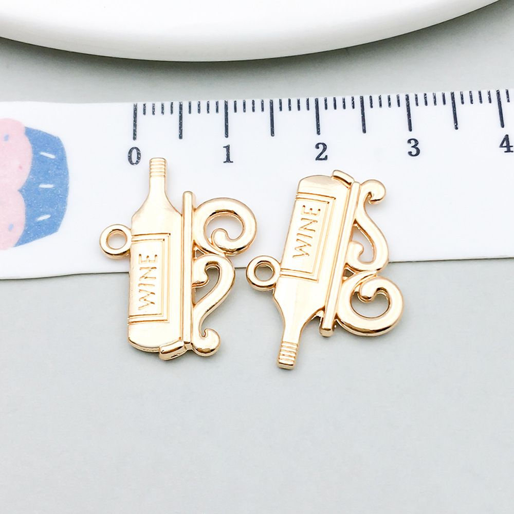 1 kc gold wine bottle 11*22mm-1.7g-20818