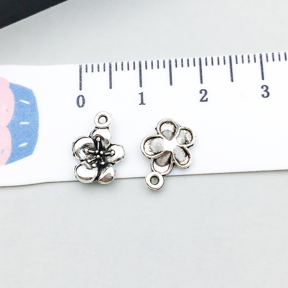 1 ancient silver plum blossom 9*13mm-0.4g-10399