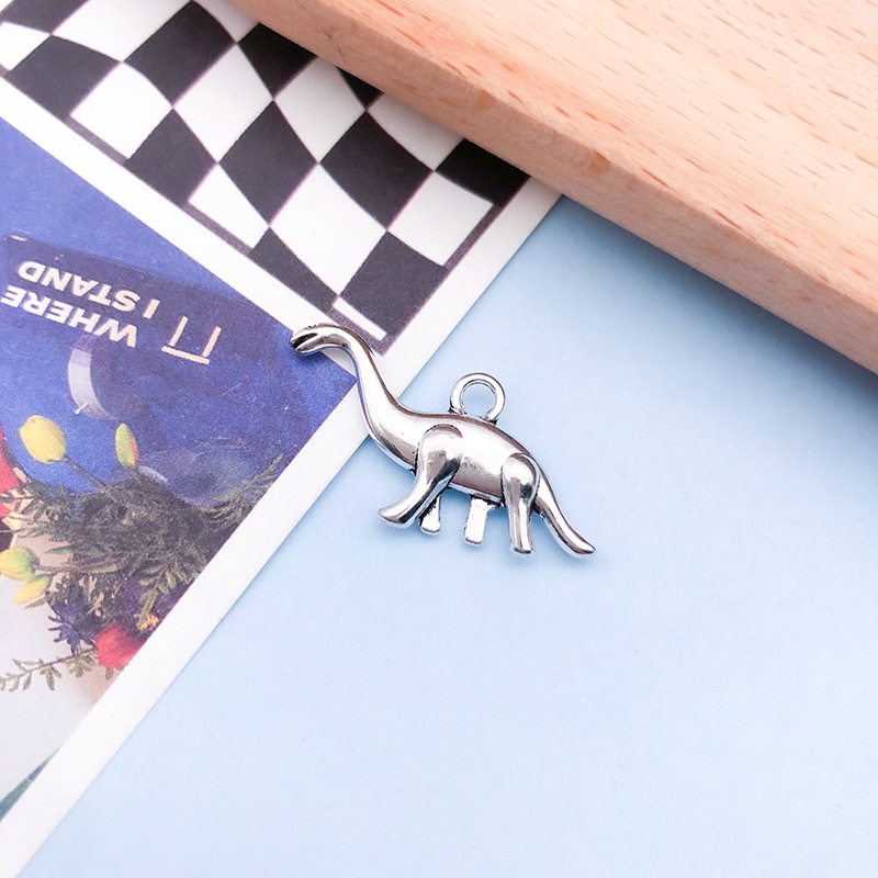 1 ancient silver long-necked dinosaur 13 × 27mm-2381/1.7g