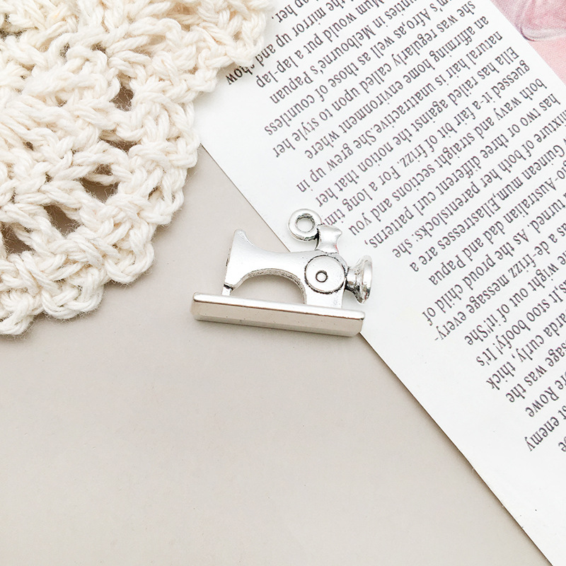 1 sewing machine 6x14x19mm-5685/2.5g