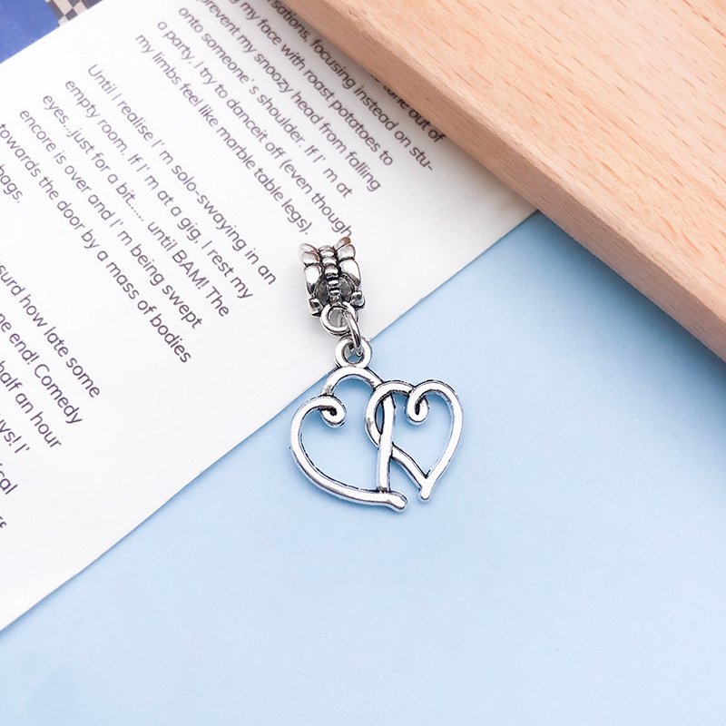 1 ancient silver hollow heart 19x31mm-11471/1.62g