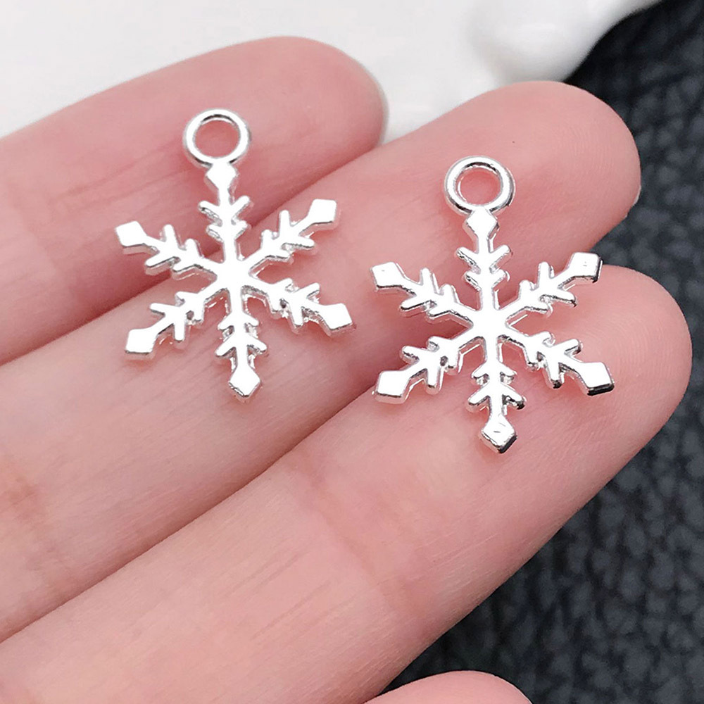 1 bright silver Christmas snowflake 13x19mm-20028-0.6g