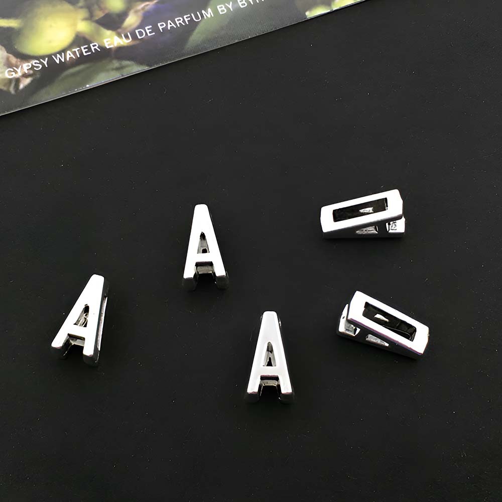1 ancient silver perforated letter A- 5x10mm-0.5g
