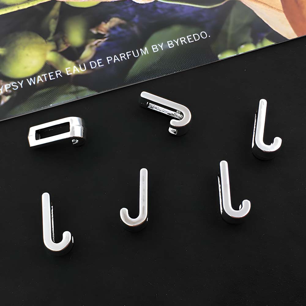 1 ancient silver perforated letter J-5x10mm-0.3g