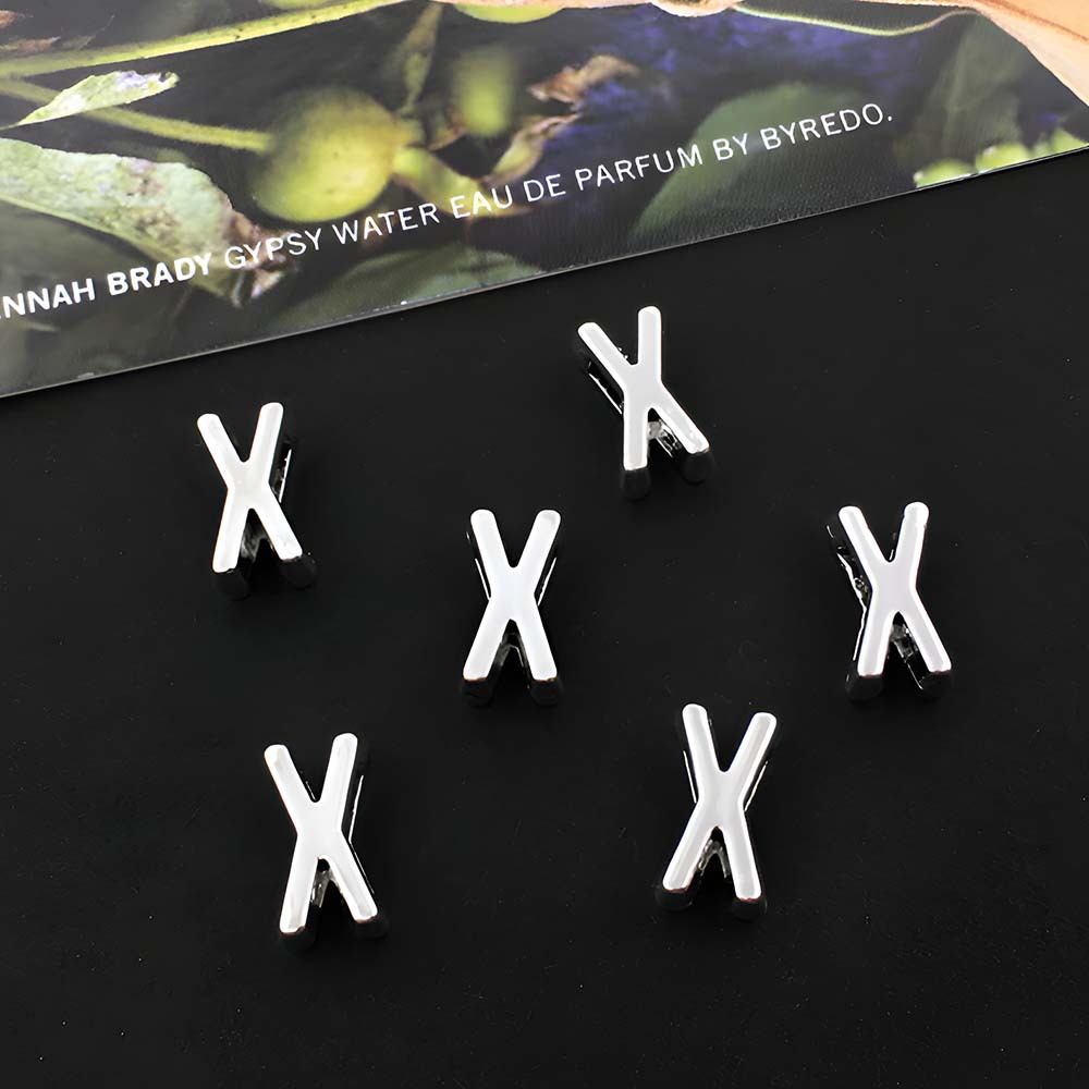 1 ancient silver perforated letter X-5x10mm-0.6g