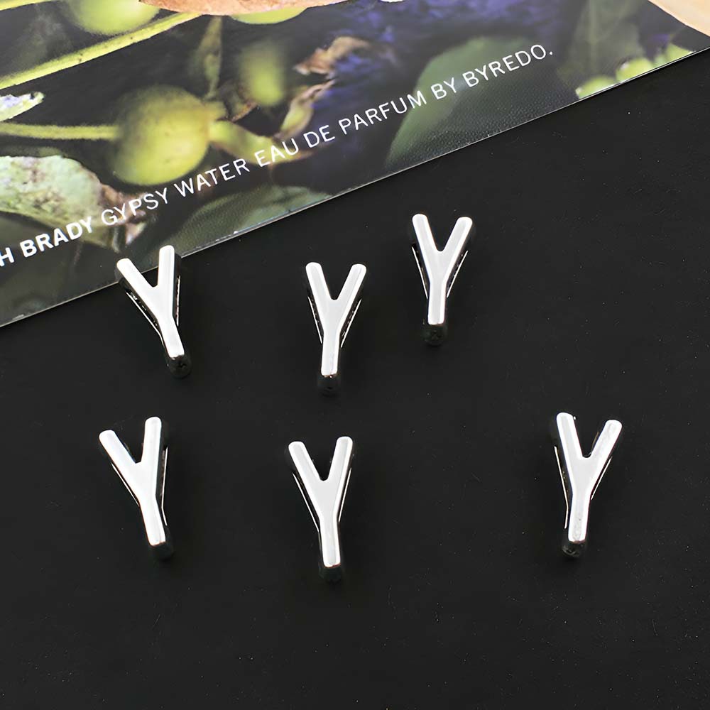1 ancient silver perforated letter Y-5x10mm-0.4g