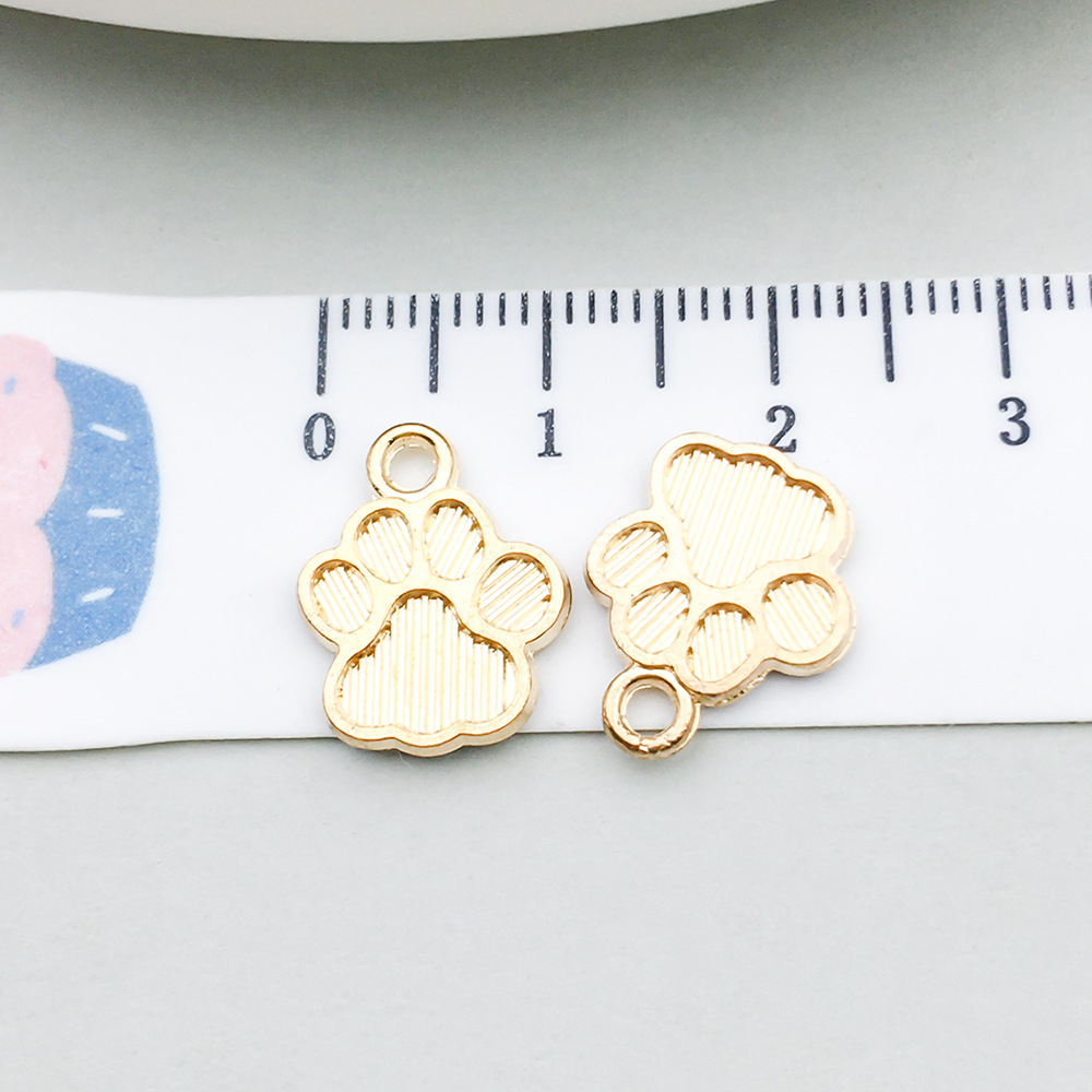 1 kc gold dog paw 12*15mm-0.8g-18328