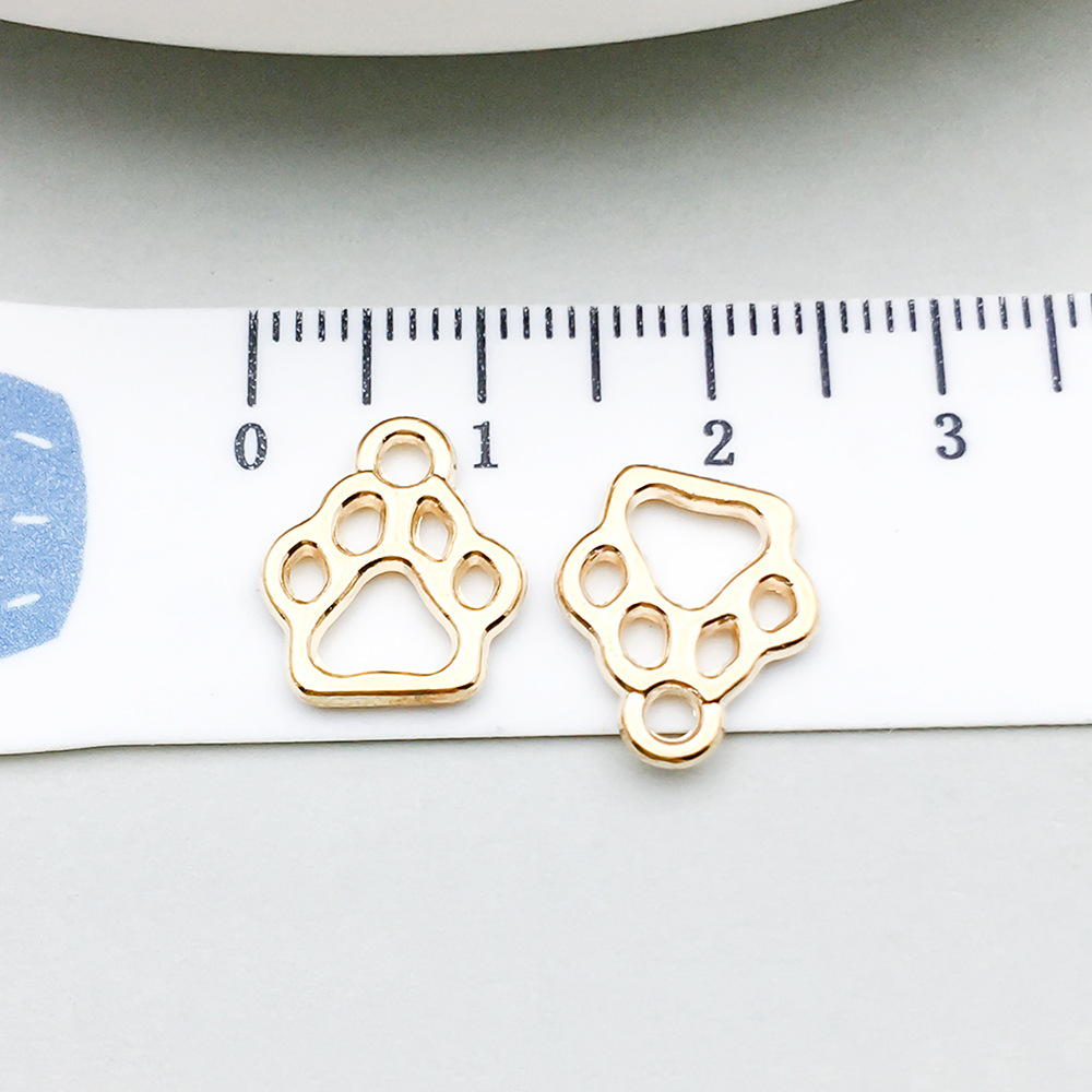 1 kc gold dog paw 11*13mm-0.6g-18336