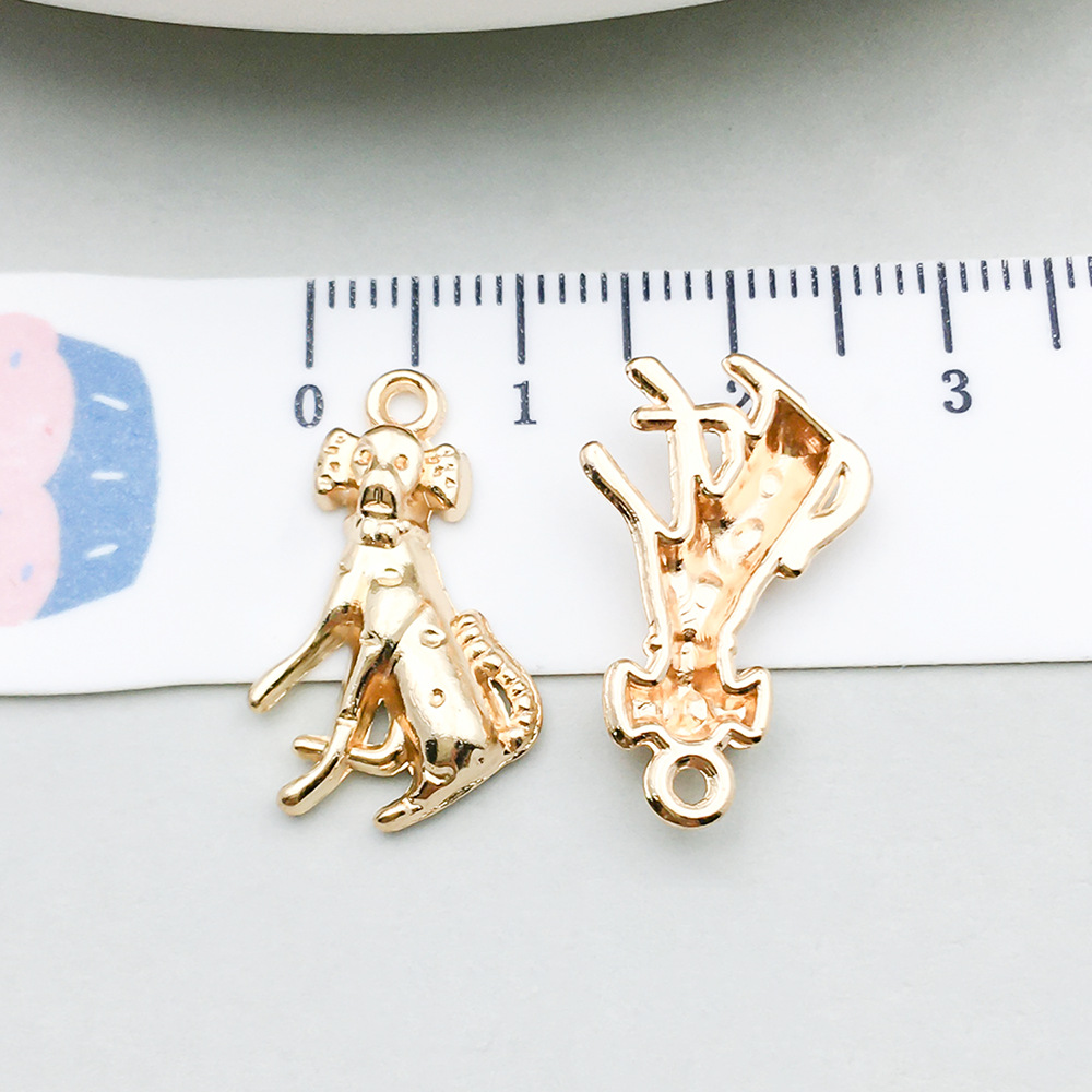 1 kc gold sitting dog 22*13mm-1.2g-20534