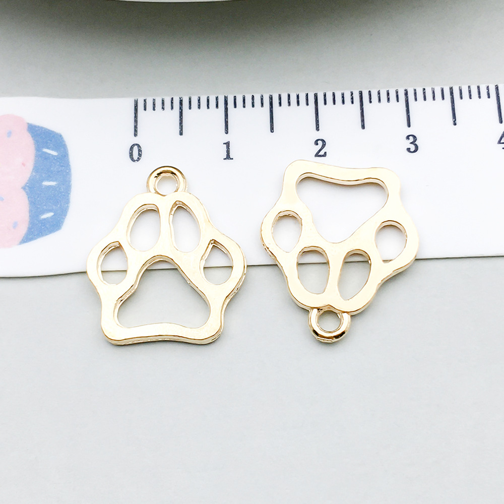 1 kc gold dog paw 20*17mm-1.2g-20626
