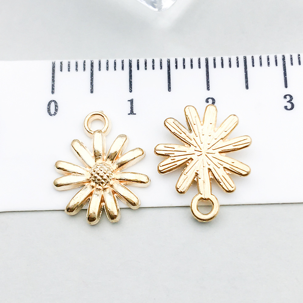 1 kc gold daisy 7*9mm-0.8g-17697