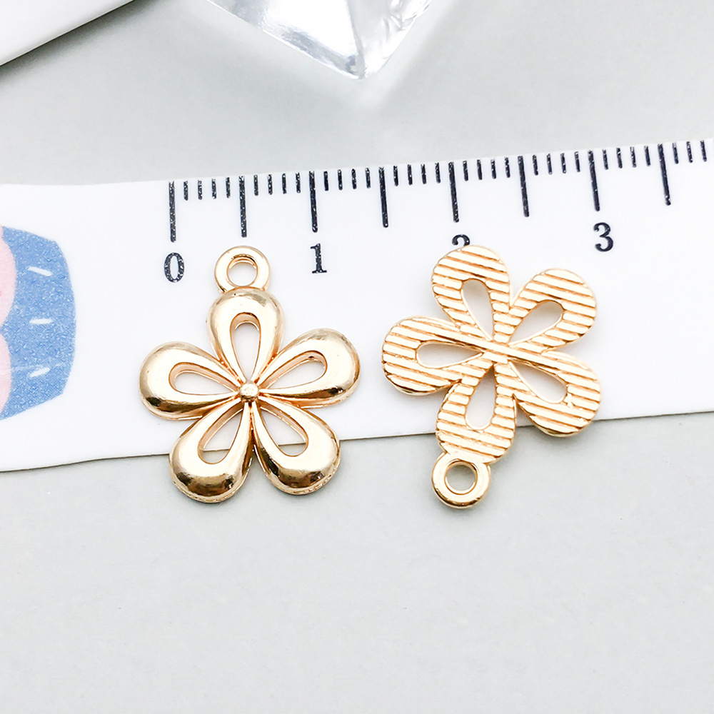 1 kc gold hollow flower 18*15mm-1.1g-20501