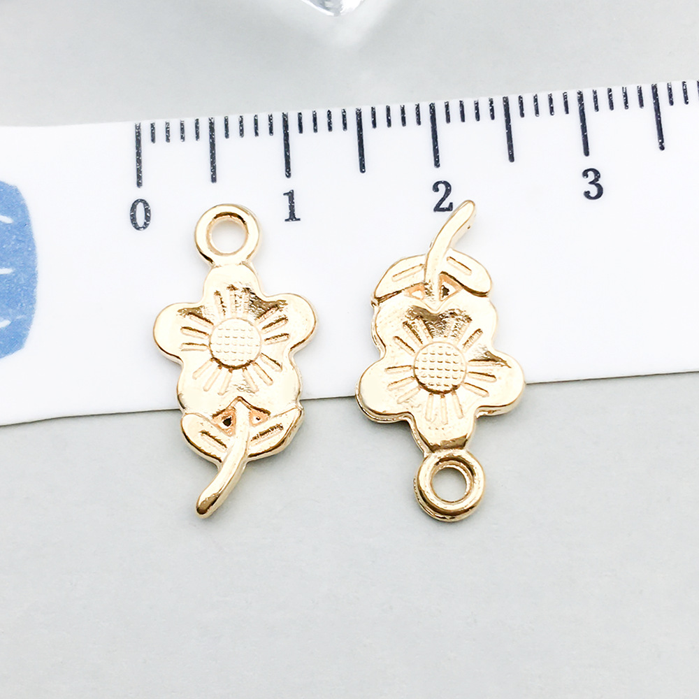 1 kc gold flower 21*11mm-1g-20508