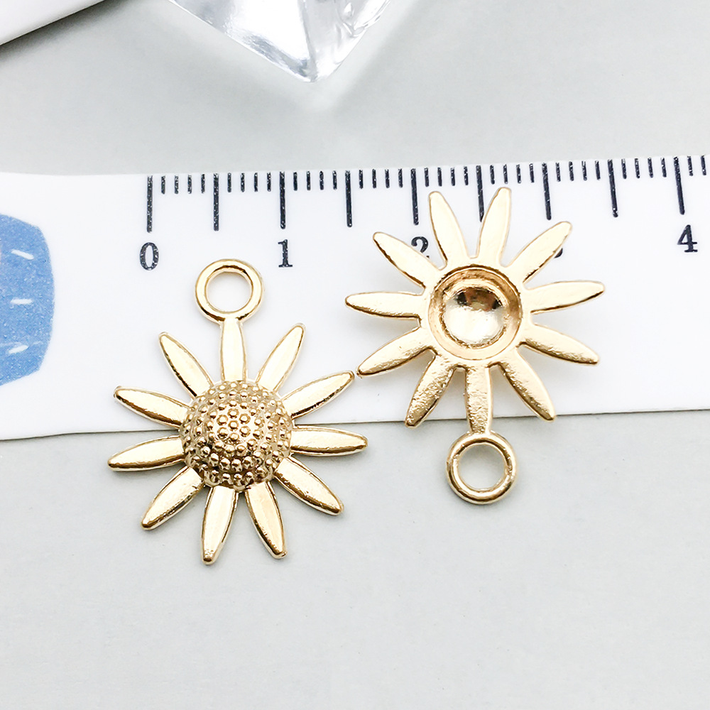 1 kc gold sunflower 23*18mm-1.4g-20510