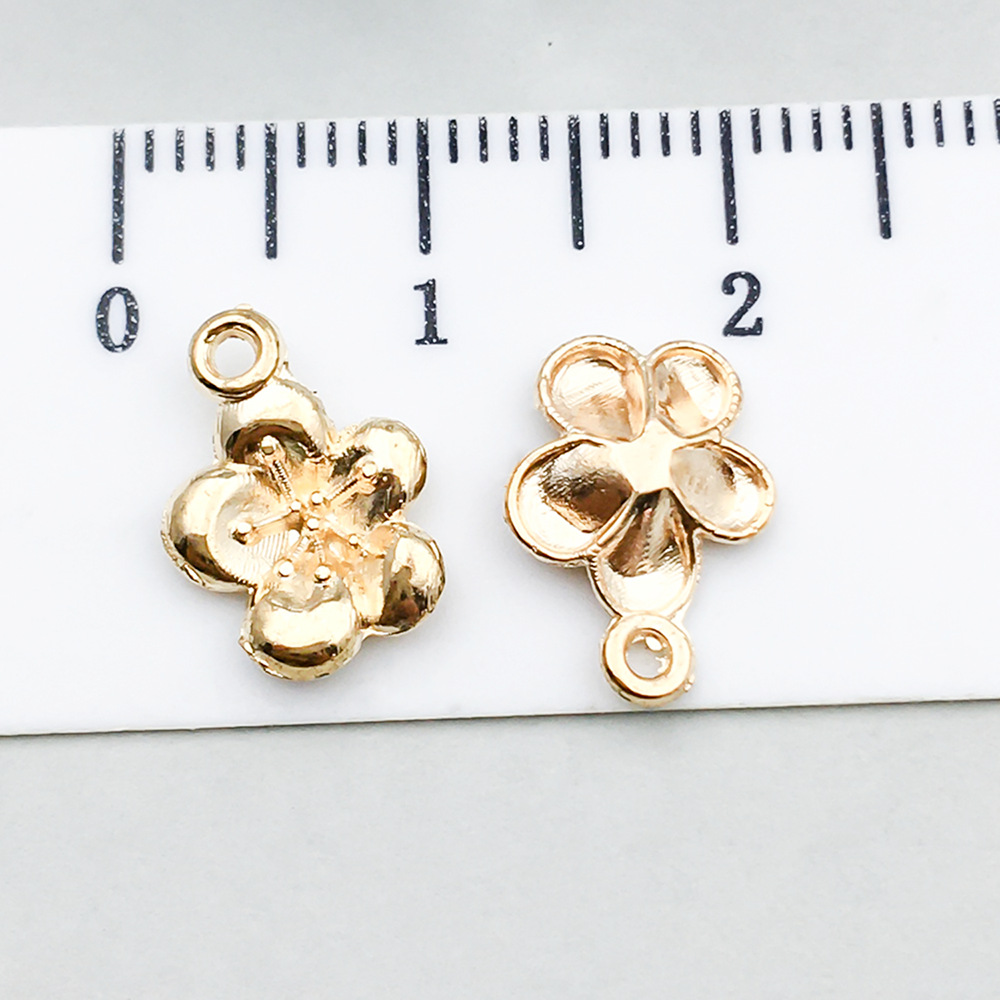 1 kc gold plum blossom 12*9mm-0.3g-20514