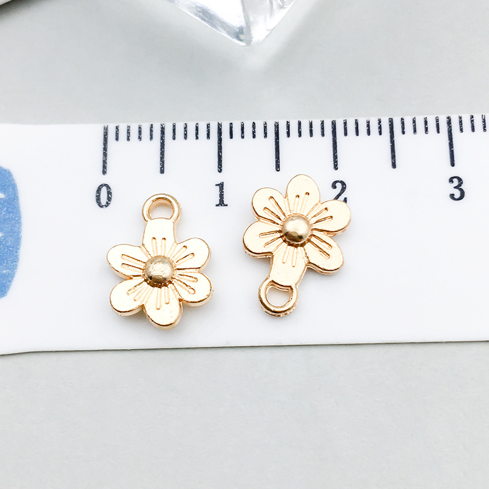 1 kc gold flower 12*9mm-0.6g-20517