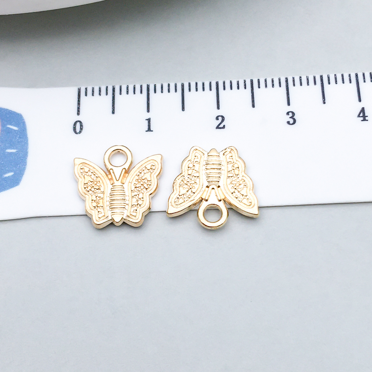 1 kc gold butterfly 13*12mm-0.9g-11612