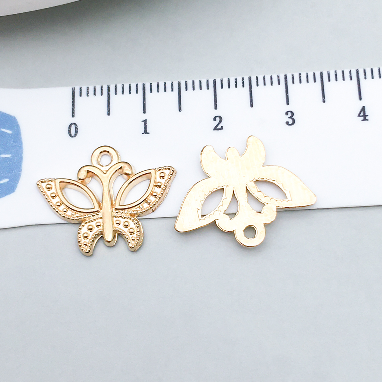 1 kc gold butterfly 19*16mm-1g-11618