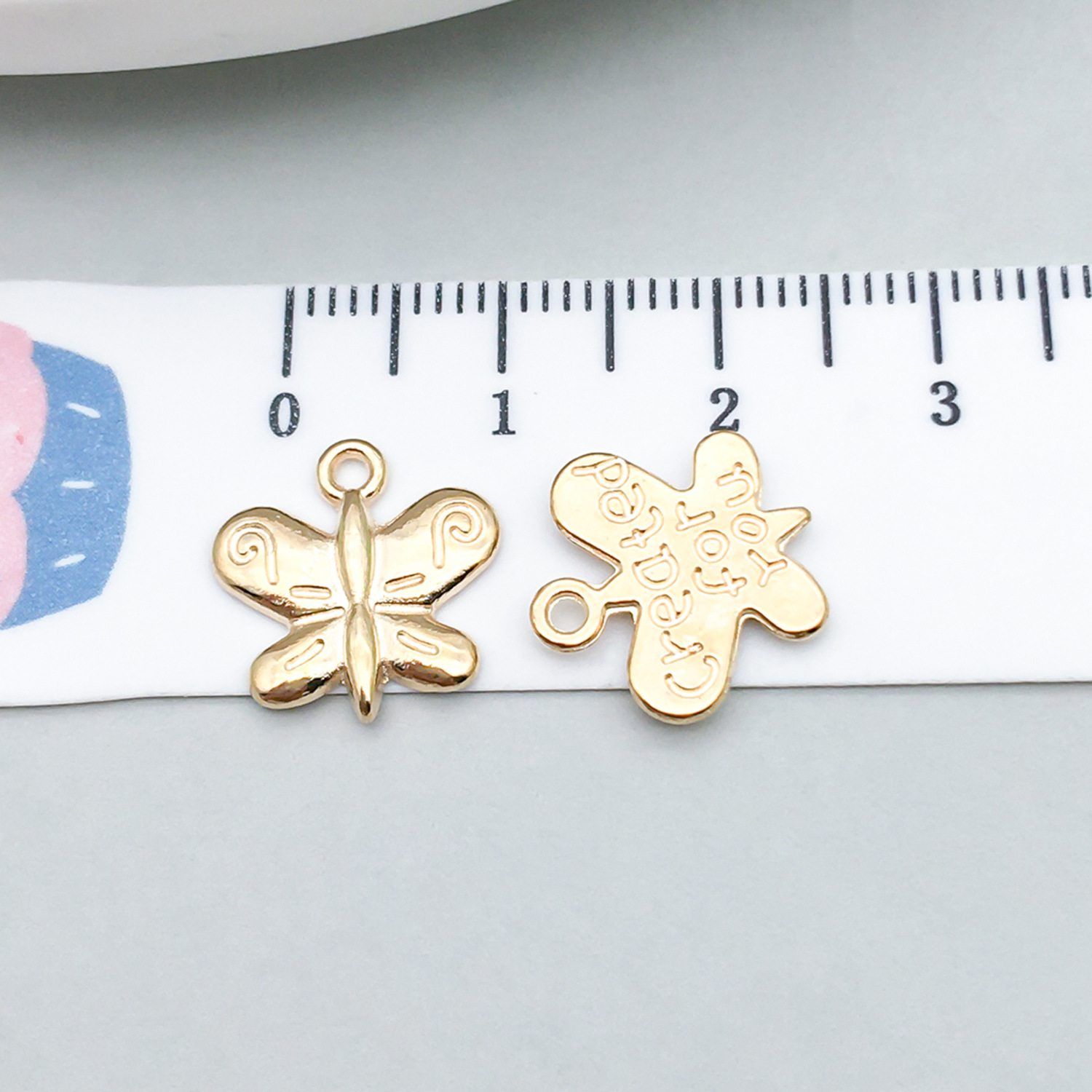 1 kc gold butterfly 8*8mm-0.8g-17705