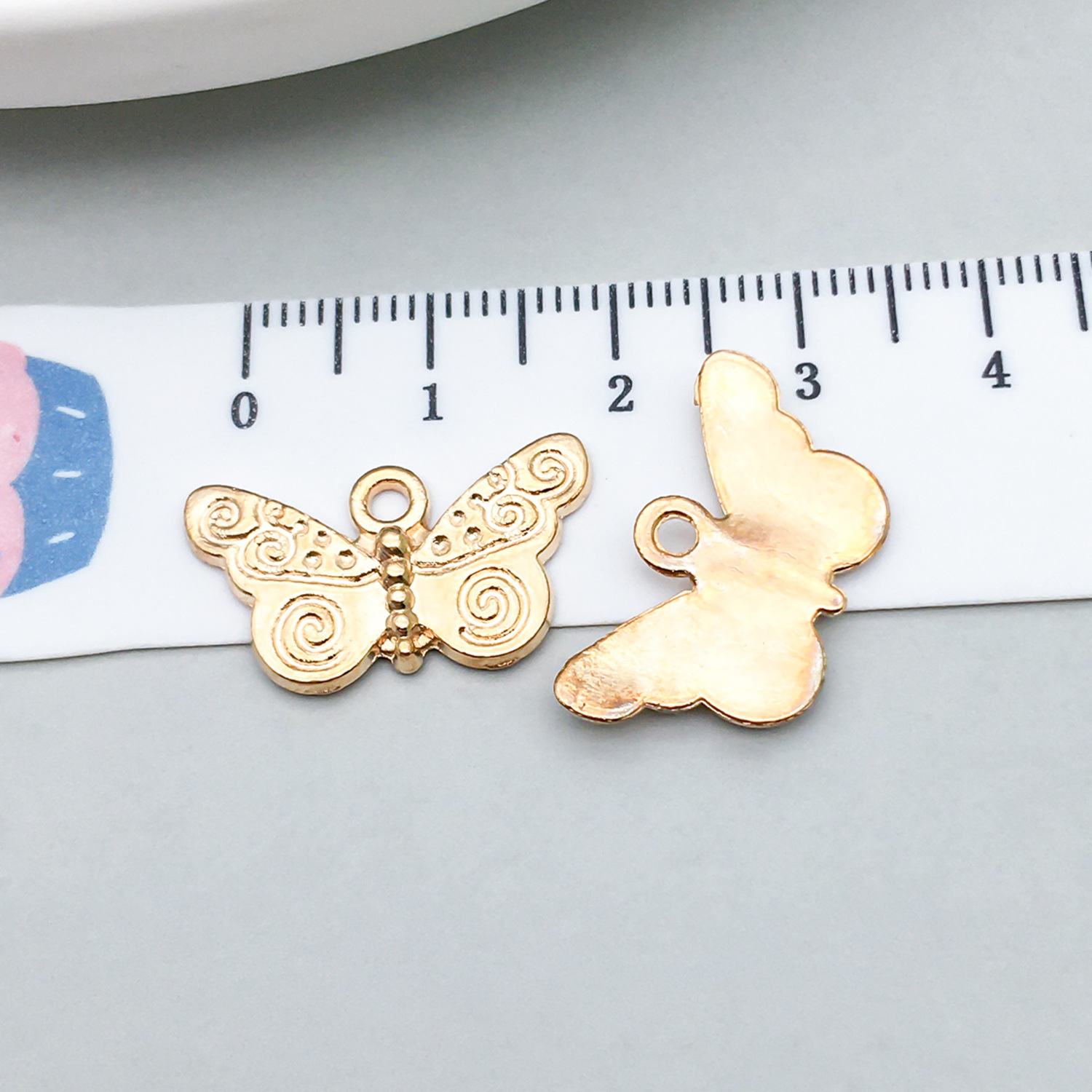 1 kc gold butterfly 22*12mm-1.3g-20132