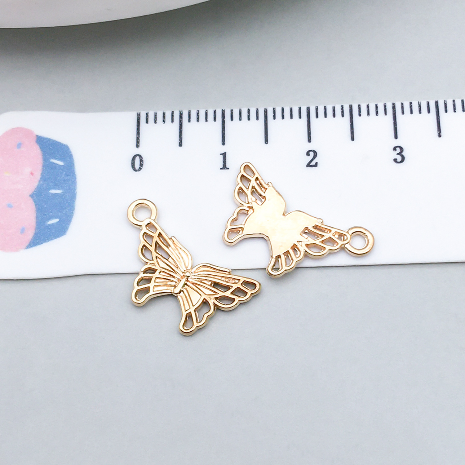 1 kc gold butterfly 18*10mm-0.5g-20139