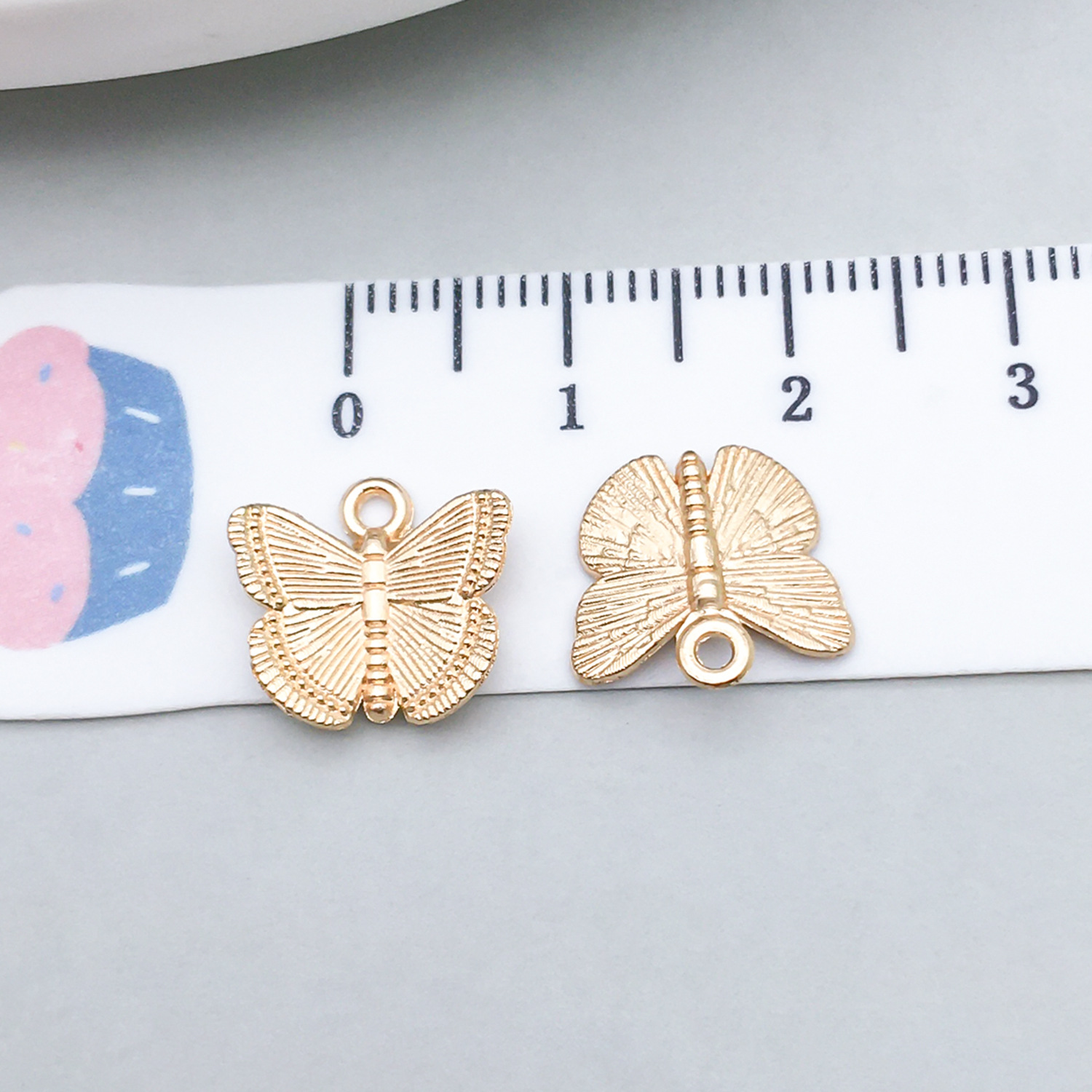 1 kc gold butterfly 12*12mm-0.5g-20145