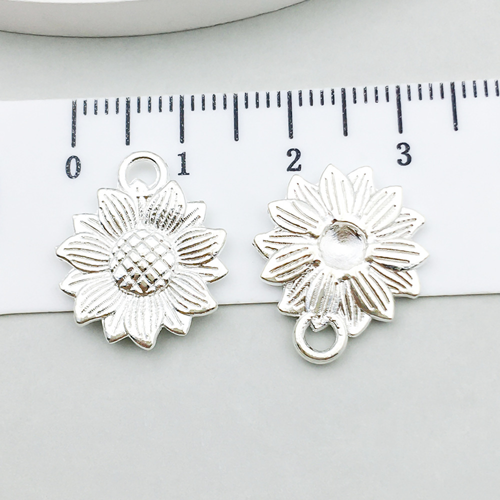 1 bright silver sunflower 18*15mm-1.4g-20448