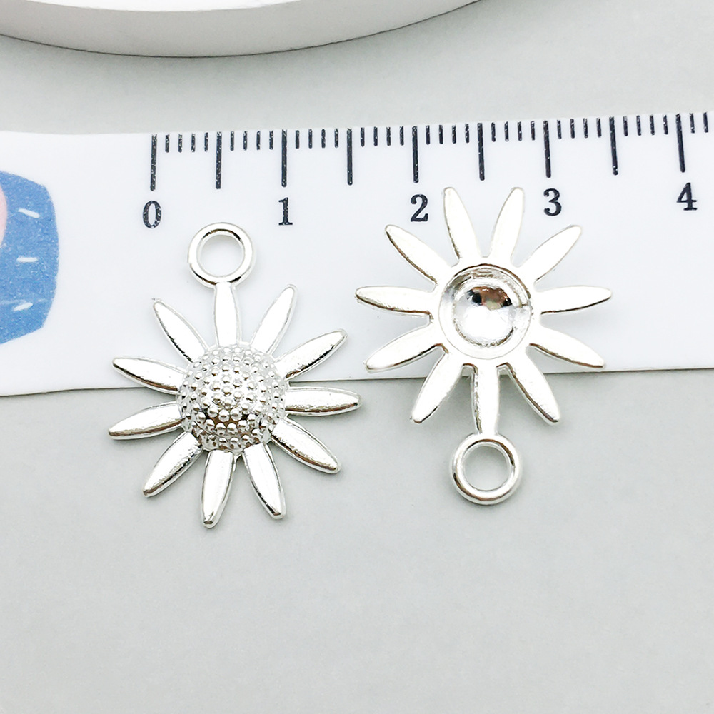 1 bright silver sunflower 23*18mm-1.4g-20455