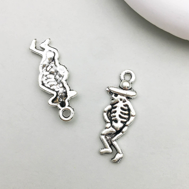 1 ancient silver skull 9*25mm-1g-10879