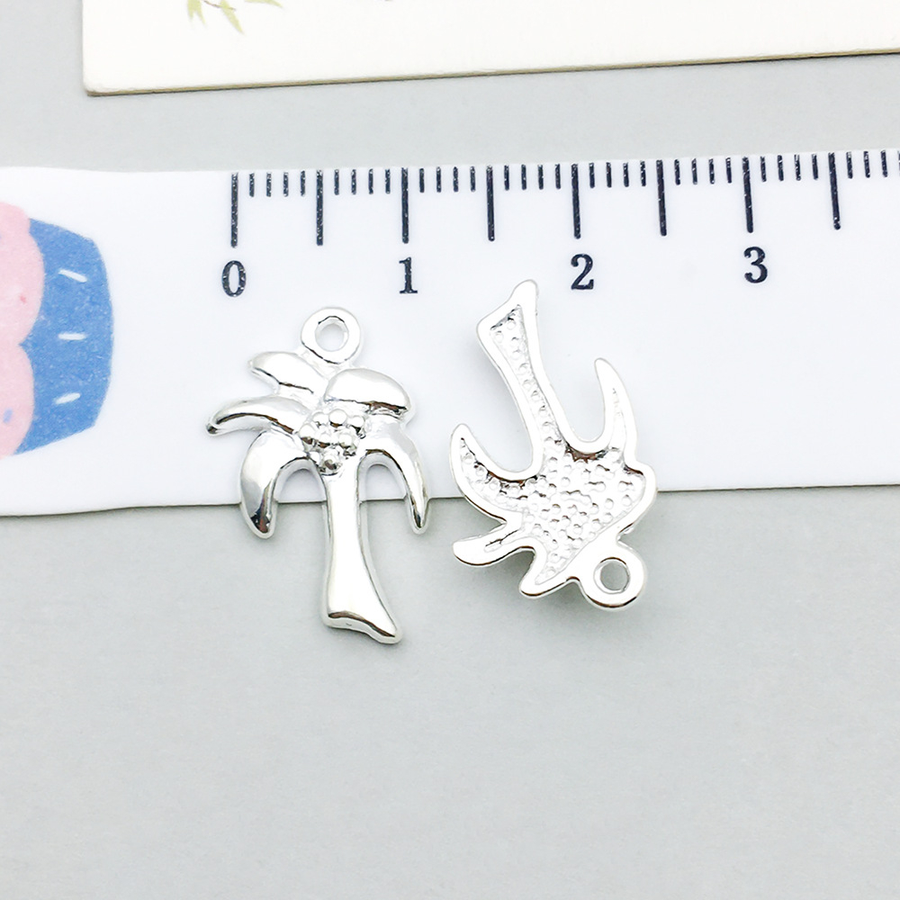 1 bright silver coconut tree 20*12mm