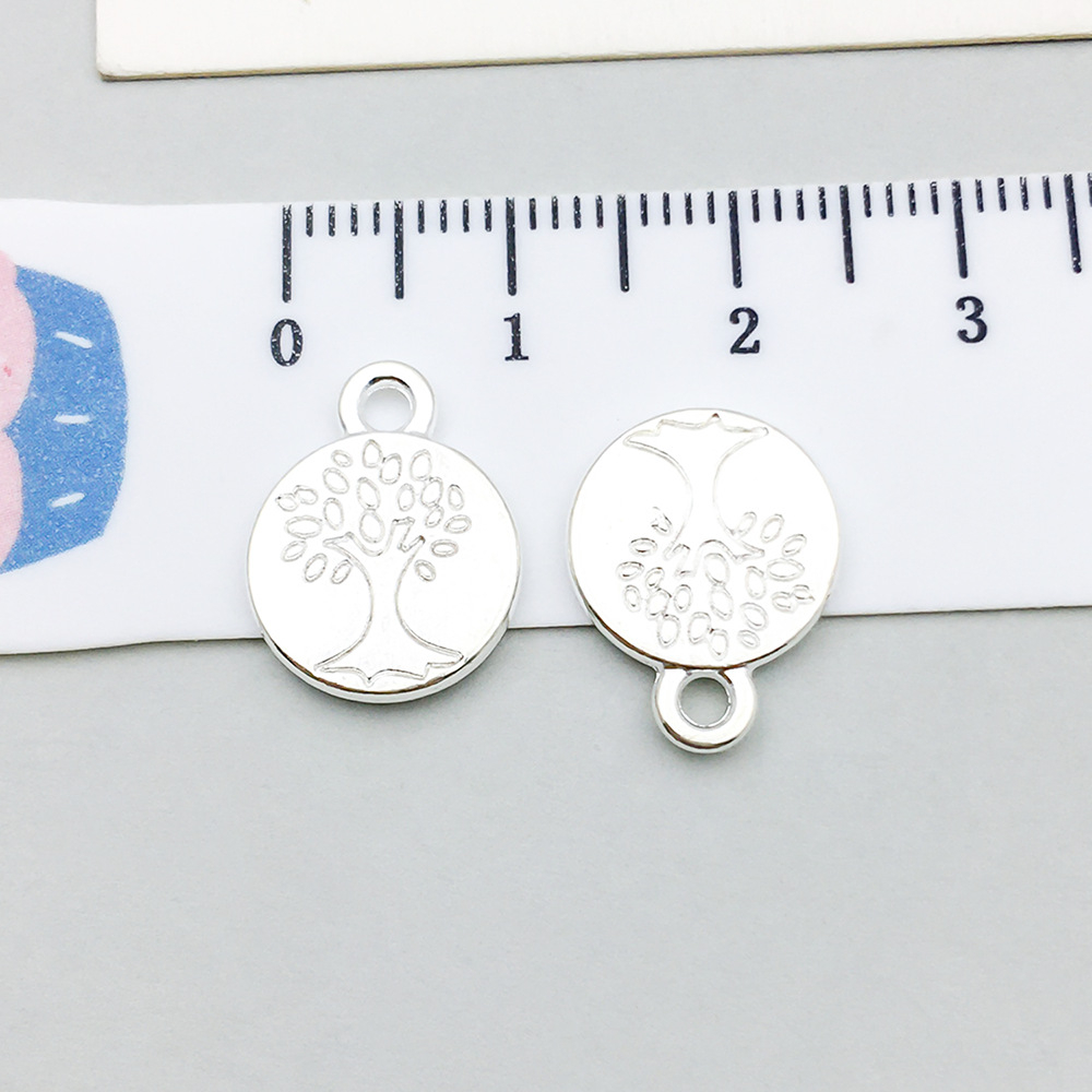 1 bright silver round tree of life 15*12mm