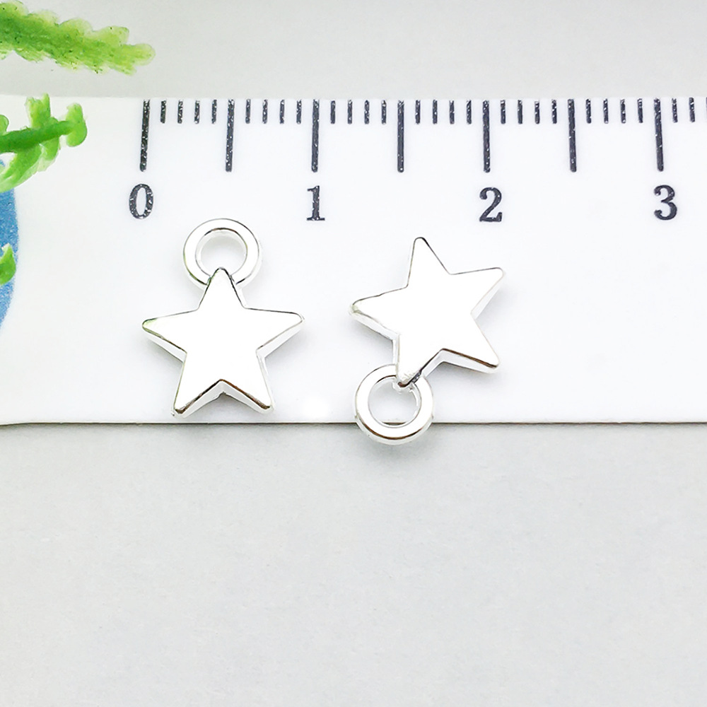 1 bright silver five-pointed star 9*12mm-0.6g-20846