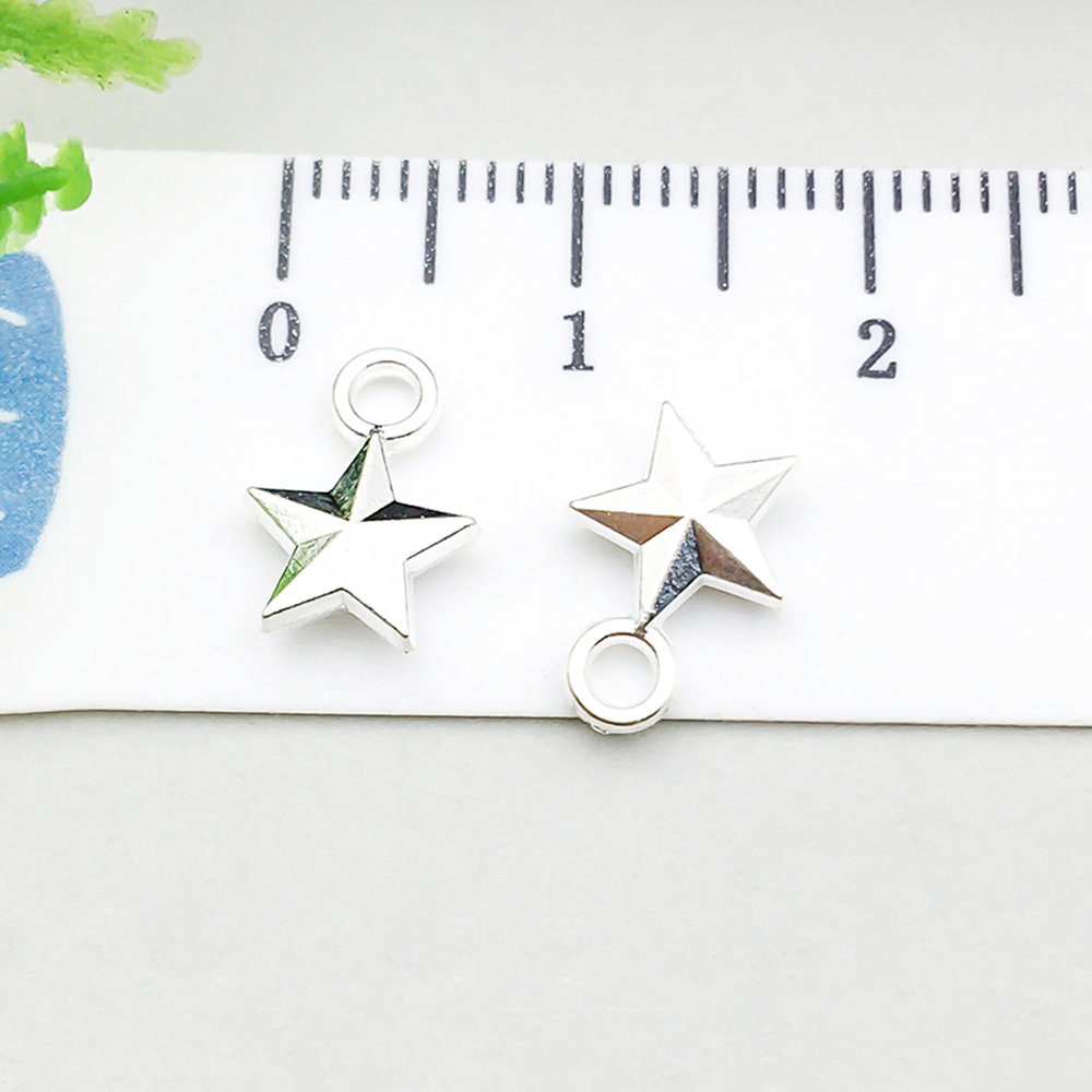 1 bright silver five-pointed star 8*11mm-0.4g-20853