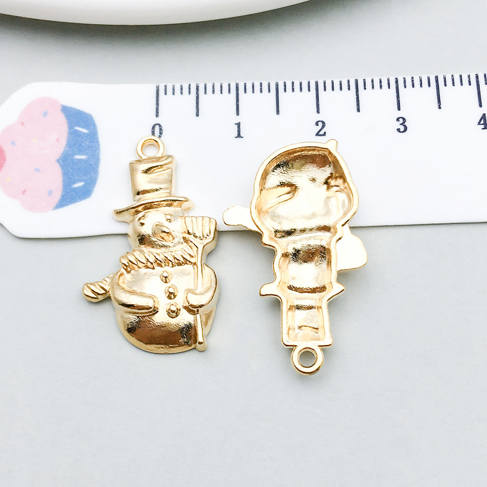 1 kc gold christmas snowman 16*27mm-1.9g-18297