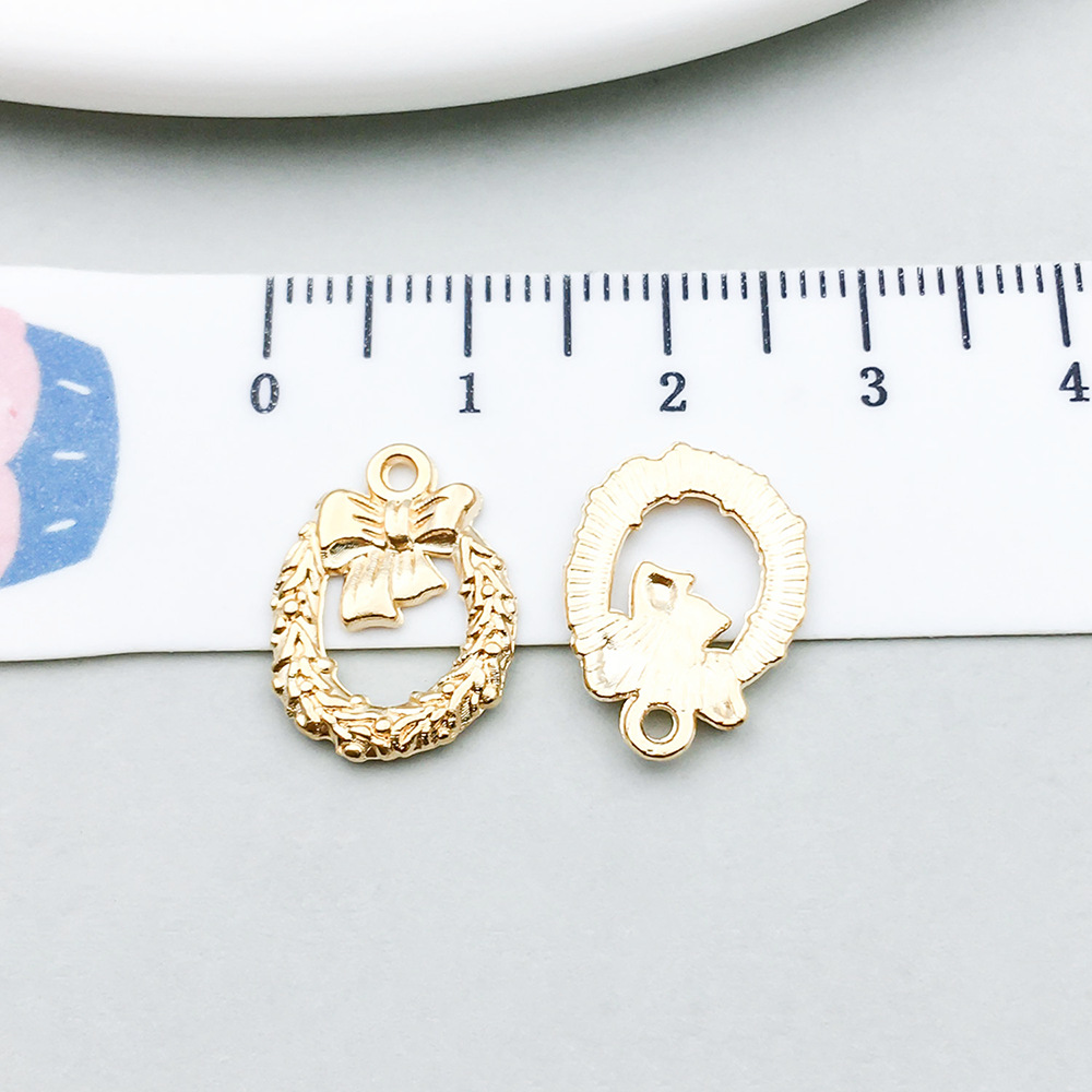 1 kc gold christmas wreath 12*16mm-0.6g-20040