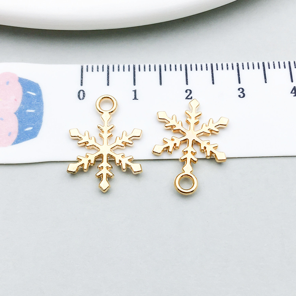 1 kc gold christmas snowflake 13*19mm-0.6g-20043