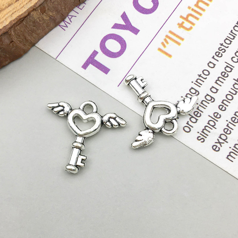 1 ancient silver love wings key 15*15mm-0.7g-11409