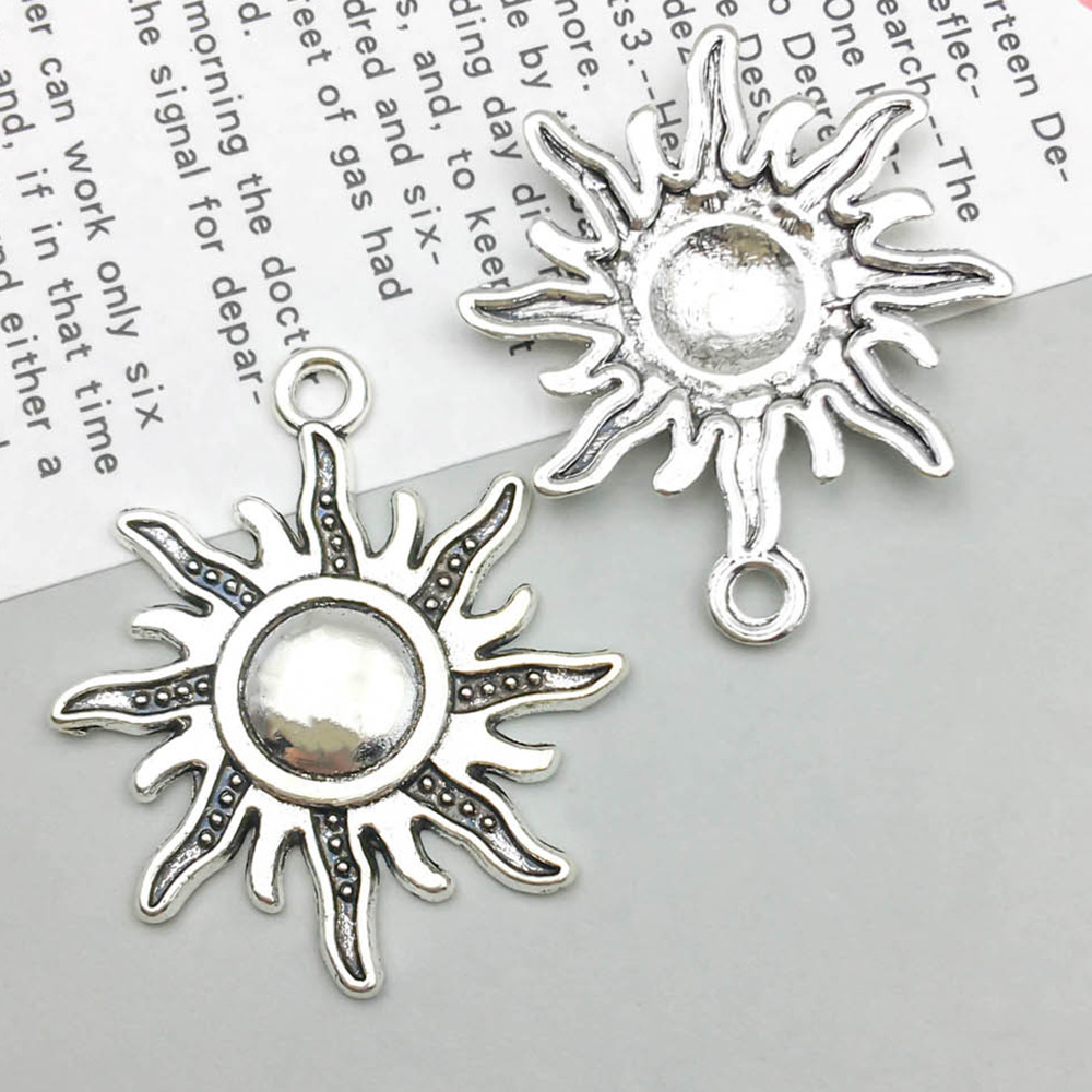 1 ancient silver sun 25*28mm-1.5g-7187