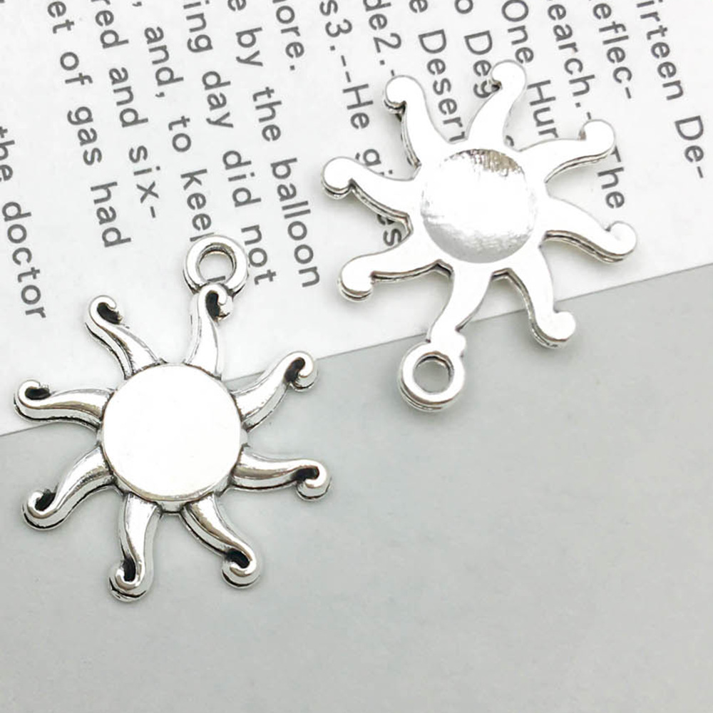 1 ancient silver sun 16*19mm-0.9g-7699