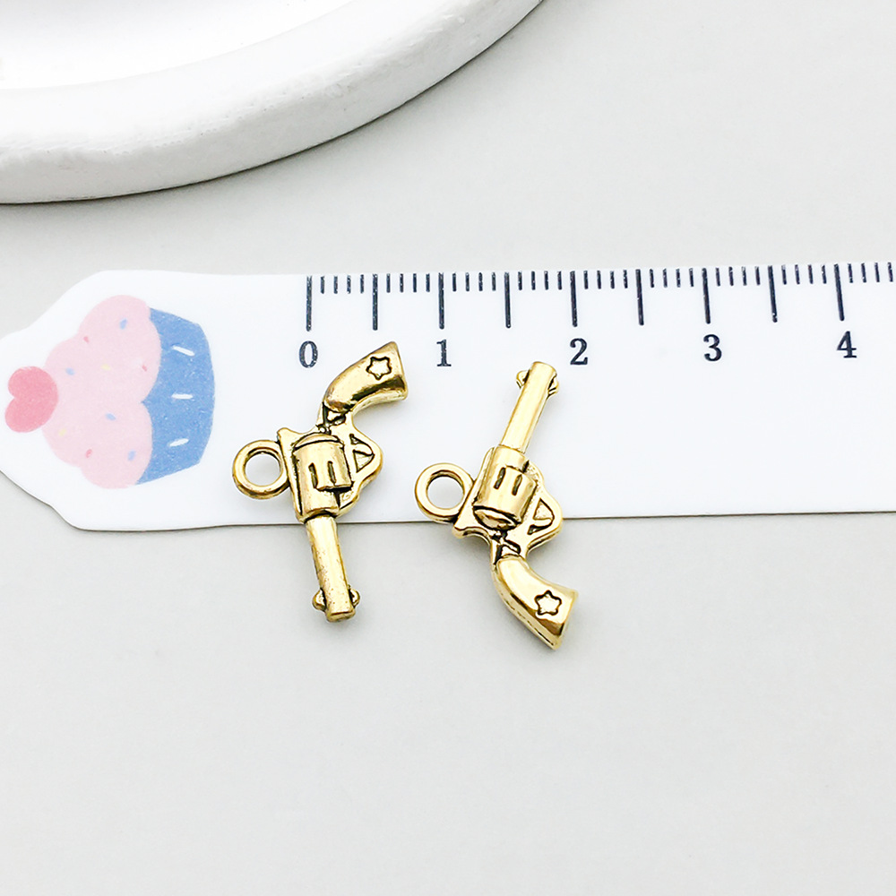 1 ancient gold pistol 14*19mm-1.2g-19229