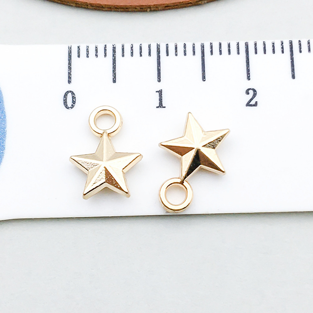 1 kc gold five-pointed star 8*11mm-0.4g-18240