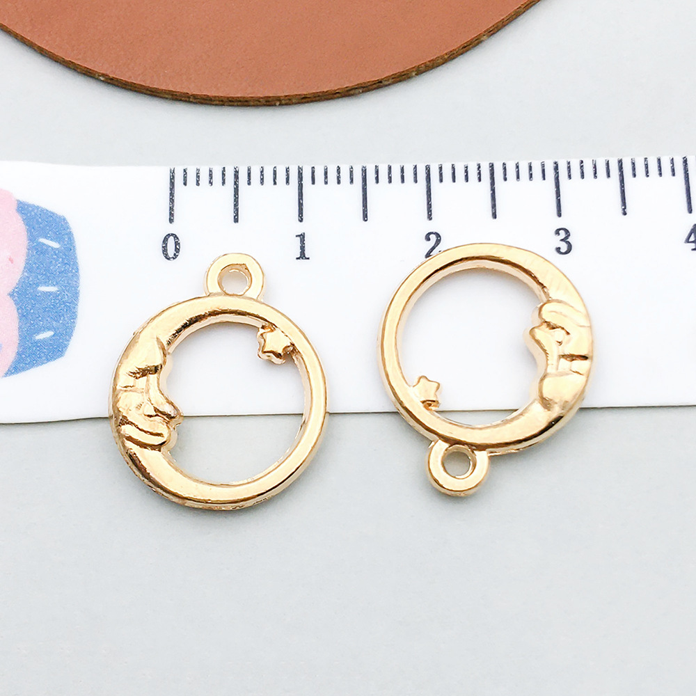 1 kc gold hollow moon 16*20mm-1.6g-18245