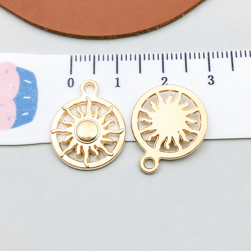 1 kc gold sun 16*20mm-1.3g-18247