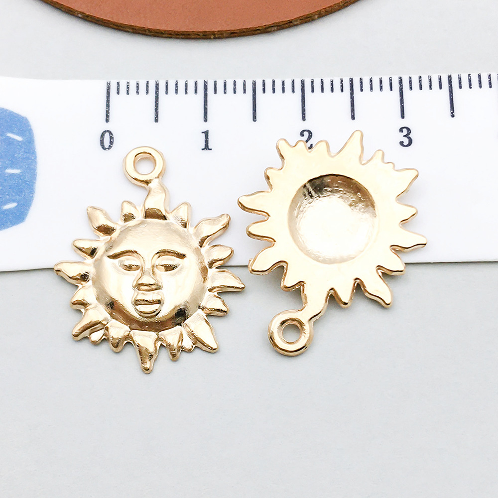 1 kc gold sun 19*22mm-2g-18250