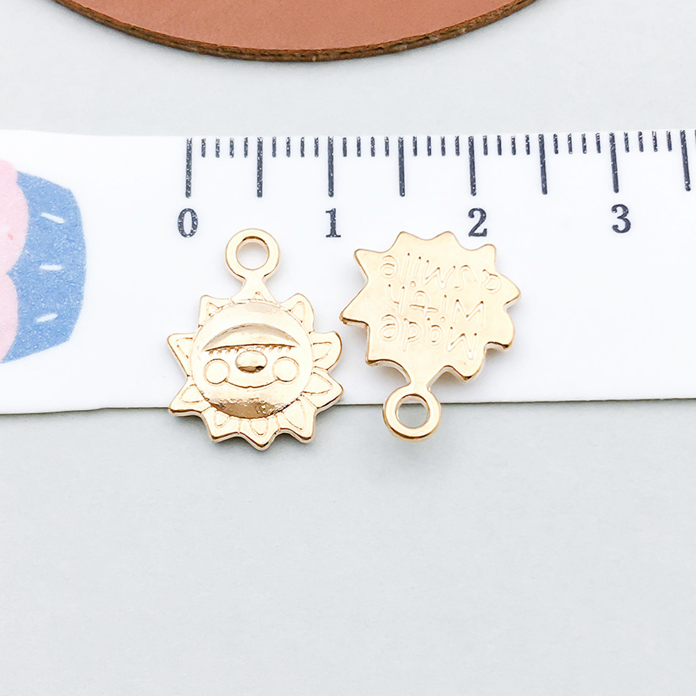 1 kc gold sun 13*16mm-1.3g-18265