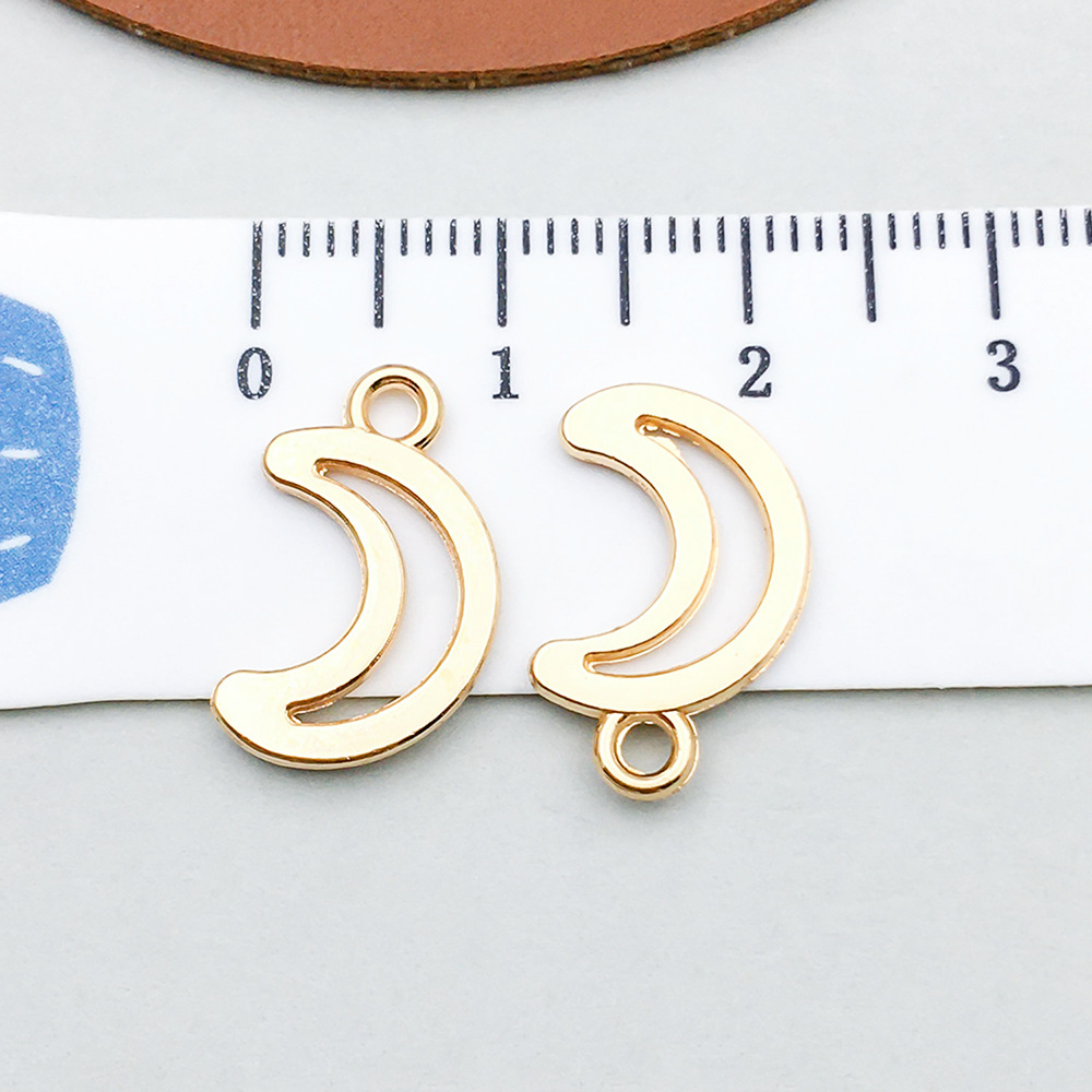 1 kc gold hollow moon 10*17mm-0.6g-20870