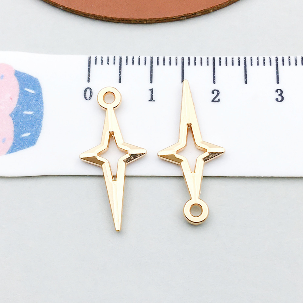 1 kc gold four-pointed star 10*23mm-0.5g-20872