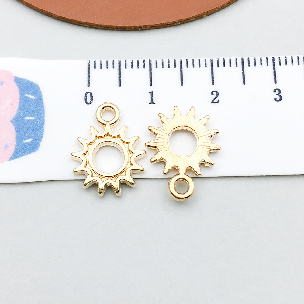 1 kc gold sun 12*15mm-0.7g-20874