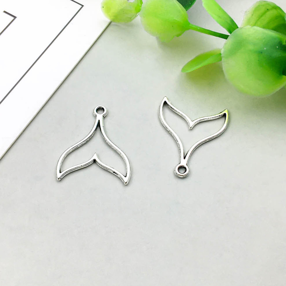 1 ancient silver hollow fish tail 17*20mm-0.5g-15555