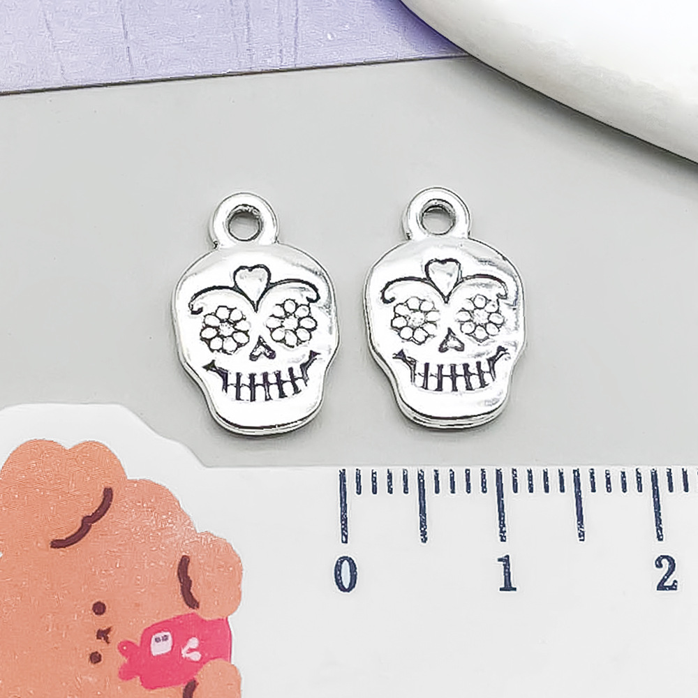 1 ancient silver flower skull 17*11mm-1.3g-10874